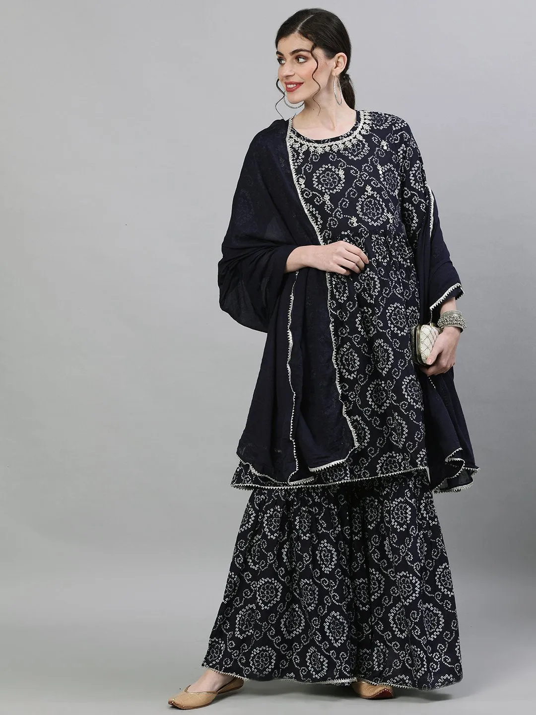 Ishin Women's Cotton Black Jewel Neck Bandhani Embellished Peplum Kurta Sharara Dupatta Set